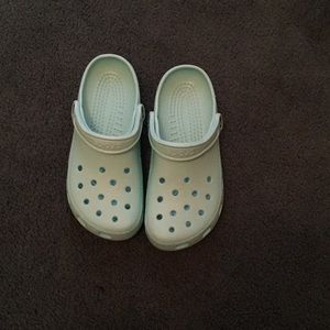 Light blue crocs.